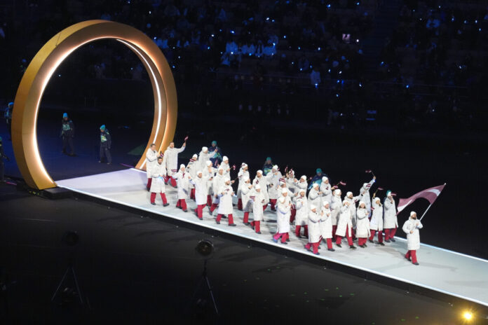 Олимпийская сборная Латвии на открытии Олимпиады 2026 в Милане. 6 февраля 2026 года. Фото: Роман Кокшаров / RKF Олимпийская сборная Латвии на открытии Олимпиады 2026 в Милане. 6 февраля 2026 года. Фото: Роман Кокшаров / RKF